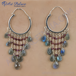 Load image into Gallery viewer, 925 sterling silver chandelier earrings featuring labradorite and garnet gemstones in a dangling design.