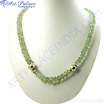 Load image into Gallery viewer, Green prehnite beaded necklace displayed on a white bust, showing the gemstone necklace's details and design.