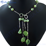 Load image into Gallery viewer, Silver tassel necklace featuring green stones, a unique and stylish jewelry piece.