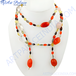 Load image into Gallery viewer, Multi-stone beaded necklace displayed on a white bust, featuring red, yellow and clear beads.