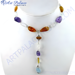 Load image into Gallery viewer, A colorful statement necklace featuring various gemstone beads, strung together on a delicate chain.