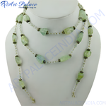 Load image into Gallery viewer, Layered green gemstone beaded necklace on a white mannequin. Elegant and stylish.