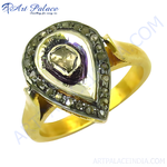 Load image into Gallery viewer, gold plating pear-shaped ring with a halo of diamonds around a gemstone center.