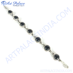 Load image into Gallery viewer, Sterling silver chain bracelet with round black onyx gemstones, perfect for any occasion.