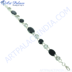 Load image into Gallery viewer, 925 sterling silver chain bracelet featuring black onyx and cubic zirconia stones