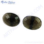 Load image into Gallery viewer, Oval smoky quartz stud earrings in a polished silver setting, showcasing faceted gemstones.