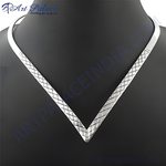 Load image into Gallery viewer, Silver v-shaped collar necklace on a black mannequin, geometric design jewelry