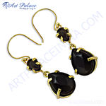 Load image into Gallery viewer, gold plating plated dangle earrings with black onyx teardrop gemstones.
