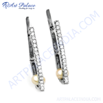 Load image into Gallery viewer, Silver dangle earrings featuring cubic zirconia and a pearl accent, perfect for women.