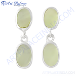 Load image into Gallery viewer, Sterling silver drop earrings featuring oval mother of pearl gemstones, showcasing a light green hue.