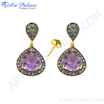 Load image into Gallery viewer, Silver drop earrings featuring a pear-shaped purple amethyst gemstone with diamond accents.
