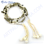 Load image into Gallery viewer, A beautiful pearl and gemstone necklace on a white background, highlighting its unique design.