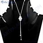 Load image into Gallery viewer, Elegant silver pendant necklace featuring sparkling cubic zirconia stones on a black background