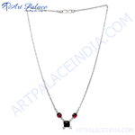 Load image into Gallery viewer, Sterling silver necklace with a black square center stone and red garnet accents