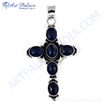 Load image into Gallery viewer, 925 sterling silver cross pendant with oval-cut blue lapis lazuli gemstones.