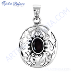 Load image into Gallery viewer, 925 sterling silver openwork pendant with a dark red oval garnet gemstone center