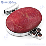 Load image into Gallery viewer, Silver pendant necklace with a large red coral gemstone and three garnet accents.