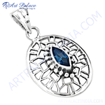 Load image into Gallery viewer, 925 sterling silver pendant with a marquise-cut blue gemstone. Features an openwork design.