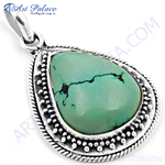 Load image into Gallery viewer, Sterling silver turquoise pendant, featuring a pear-shaped green turquoise gemstone. Elegant design for women.