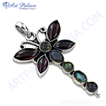 Load image into Gallery viewer, Sterling silver dragonfly pendant with garnet and labradorite gemstones, a colorful and unique jewelry piece.