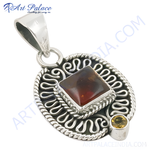 Load image into Gallery viewer, 925 sterling silver garnet pendant with ornate detailing and a small citrine accent stone, a beautiful red and yellow gemstone jewelry.