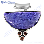 Load image into Gallery viewer, 925 sterling silver pendant with a large purple charoite gemstone and three garnet accents.