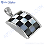 Load image into Gallery viewer, Sterling silver checkered pendant with black and mother of pearl squares, a stylish charm.