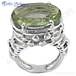 Load image into Gallery viewer, Sterling silver ring with a large oval-cut green amethyst gemstone, a beautiful green color in a striking design.