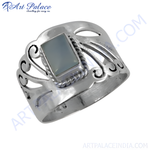 Load image into Gallery viewer, Sterling silver ring with a rectangular green gemstone. The ring has an openwork design.