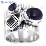 Load image into Gallery viewer, Sterling silver ring with amethyst gemstones. Features oval and square-cut amethyst stones.