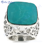 Load image into Gallery viewer, Sterling silver ring with a large turquoise stone. Turquoise color varies slightly due to the unique veining. Men's statement jewelry piece.