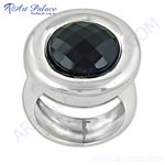 Load image into Gallery viewer, A silver ring with a large, faceted black gemstone set in a polished silver band.