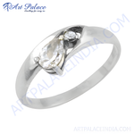 Load image into Gallery viewer, Sterling silver ring with a pear-cut cubic zirconia center stone and a small round accent stone.