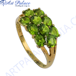 Load image into Gallery viewer, gold plating cluster ring featuring oval-cut peridot gemstones in a setting, showcasing a vibrant green color.