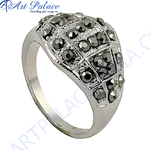 Load image into Gallery viewer, Close-up view of a silver marcasite ring with black gemstones, set in a silver band