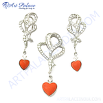 Load image into Gallery viewer, Silver pendant and earring set featuring heart-shaped coral gemstones.