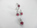 Load image into Gallery viewer, Silver ring, earrings, and pendant jewelry set featuring red ruby gemstones.