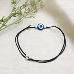 Load image into Gallery viewer, Adjustable Black Cord Evil Eye Bracelet with Silver Beads for Protection