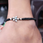 Load image into Gallery viewer, Black Cord Flower Bracelet with Turquoise Bead, Adjustable
