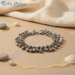 Load image into Gallery viewer, Silver bell anklet on a white background, perfect for adding a touch of elegance to any outfit.