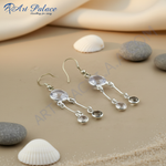 Load image into Gallery viewer, Sterling silver dangle earrings with clear and smoky quartz gemstones.