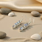 Load image into Gallery viewer, Sterling silver dangle earrings featuring multiple blue moonstone gemstones.