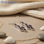 Load image into Gallery viewer, Sterling silver drop earrings featuring multiple oval-cut purple amethyst gemstones, a classic elegant design