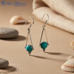 Load image into Gallery viewer, 925 sterling silver drop earrings featuring turquoise gemstones. Stylish and colorful women's earrings.