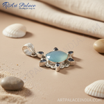 Load image into Gallery viewer, 925 sterling silver pendant with a large, light blue chalcedony center stone and black accent gemstones.