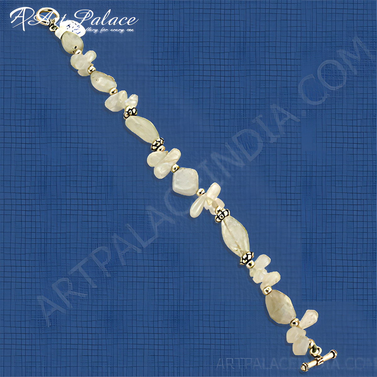 Gemstone bead bracelet with natural cream colored beads, gold plating accents and secure clasp