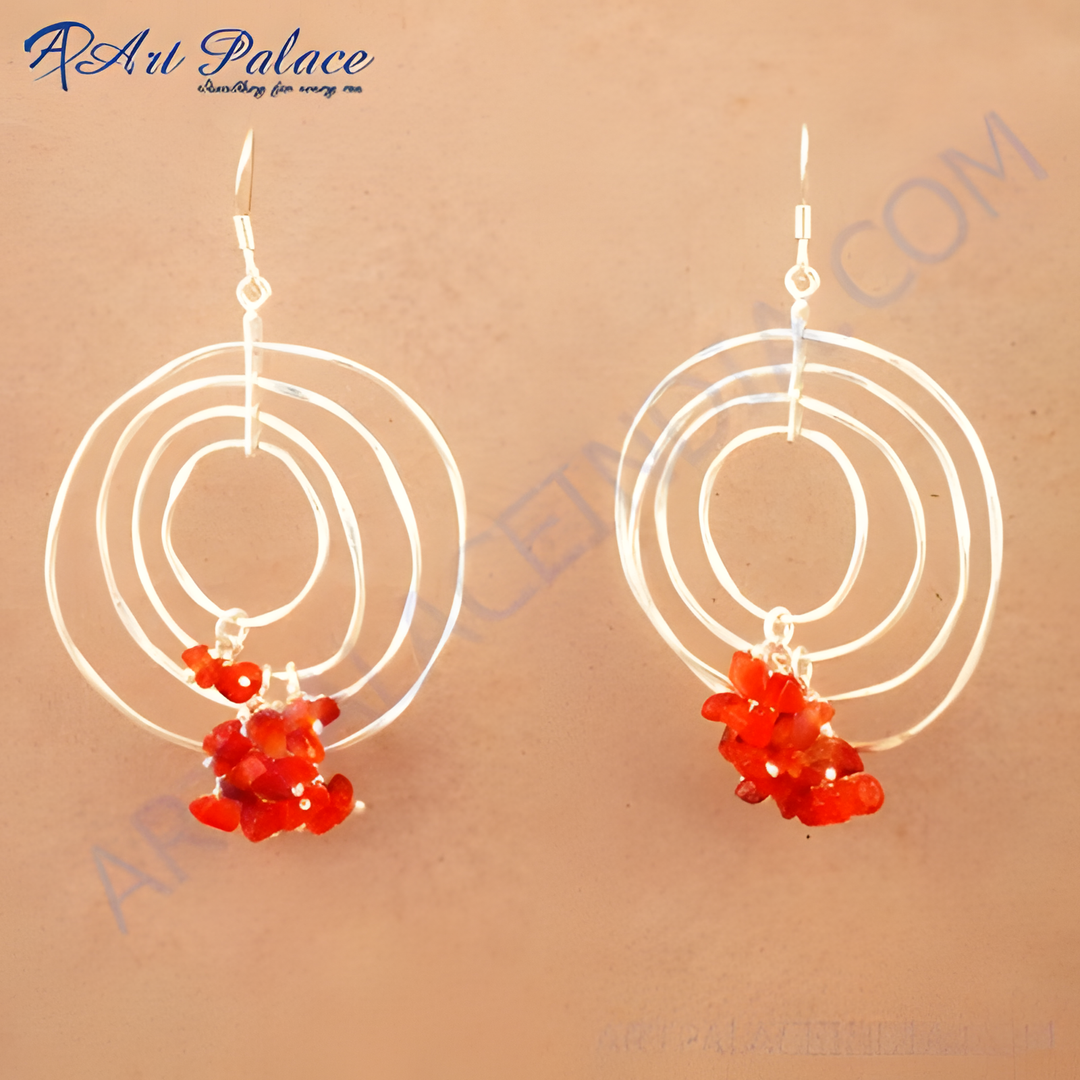 925 sterling silver dangle earrings featuring a multi-circle design and vibrant red gemstones.