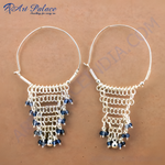 Load image into Gallery viewer, Sterling silver hoop earrings with a cascade of blue gemstones for women.
