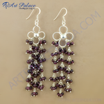 Load image into Gallery viewer, 925 sterling silver drop earrings with dark red garnet gemstones and flower design.
