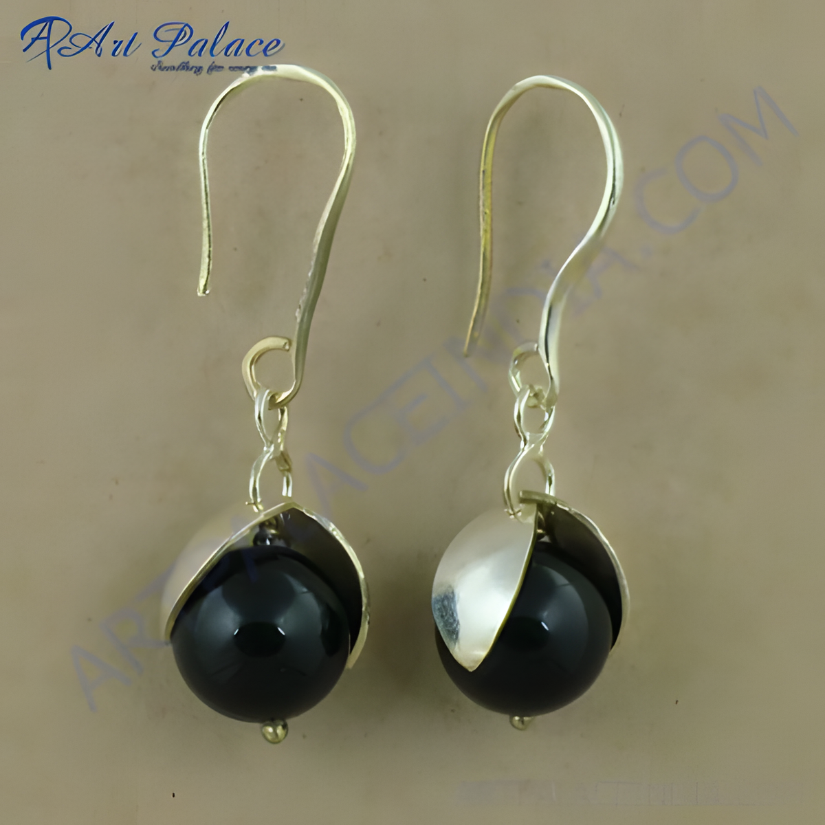 Sterling silver dangle earrings with large black onyx gemstone balls and silver hooks